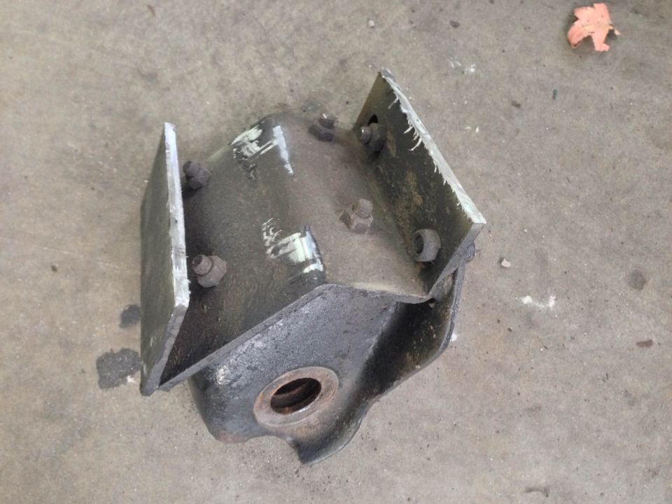 Metal bracket with bolts on concrete