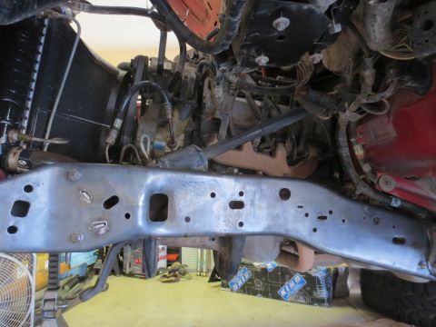 1996 Ford Bronco - Underside view of vehicle frame and engine components, likely during a repair or build.