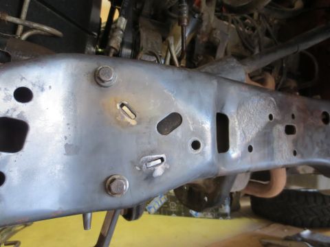 1996 Ford Bronco - Underside view of a vehicle's frame, showing suspension and mechanical components.