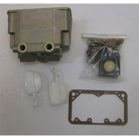 1972 Ford Ranchero - Carburetor parts laid out on a surface, including a main body, floats, gasket, and a bag of small components.
