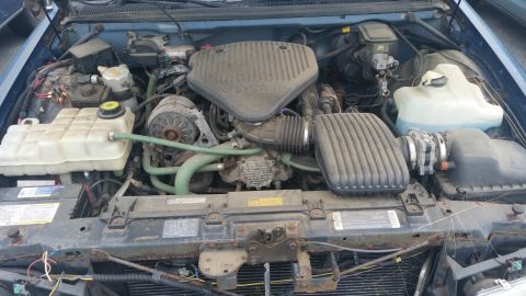 1991 Ford LTD Crown Victoria - Photograph of a Chevrolet Caprice engine bay, not a technical document.