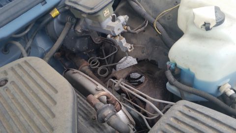 1991 Ford LTD Crown Victoria - Photograph of a Caprice engine bay detail, not a technical document.