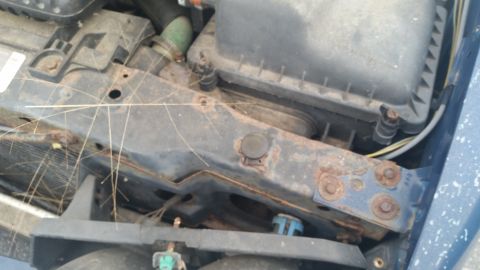 1991 Ford LTD Crown Victoria - Photograph of the radiator support area of a Caprice, not a technical document.