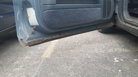1991 Ford LTD Crown Victoria - Photograph of a Caprice door sill area, not a technical document.