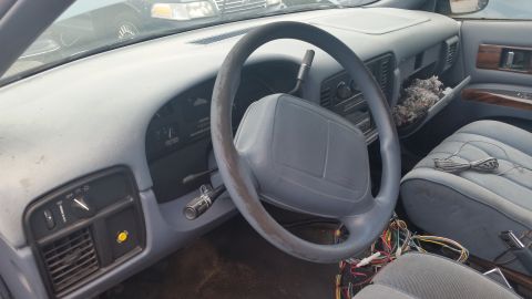 1991 Ford LTD Crown Victoria - Photograph of the Caprice interior dashboard and steering wheel, not a technical document.