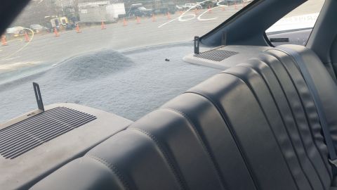 1991 Ford LTD Crown Victoria - Photograph of the Caprice rear interior and parcel shelf, not a technical document.