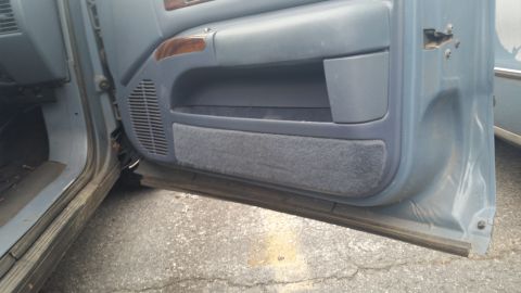 1991 Ford LTD Crown Victoria - Photograph of a Caprice door panel, not a technical document.