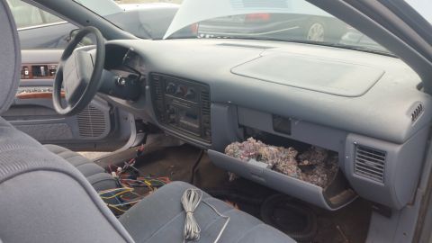 1991 Ford LTD Crown Victoria - Photograph of the Caprice passenger-side dashboard interior, not a technical document.