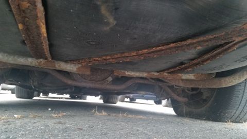1991 Ford LTD Crown Victoria - Photograph of the Caprice undercarriage and rear suspension, not a technical document.