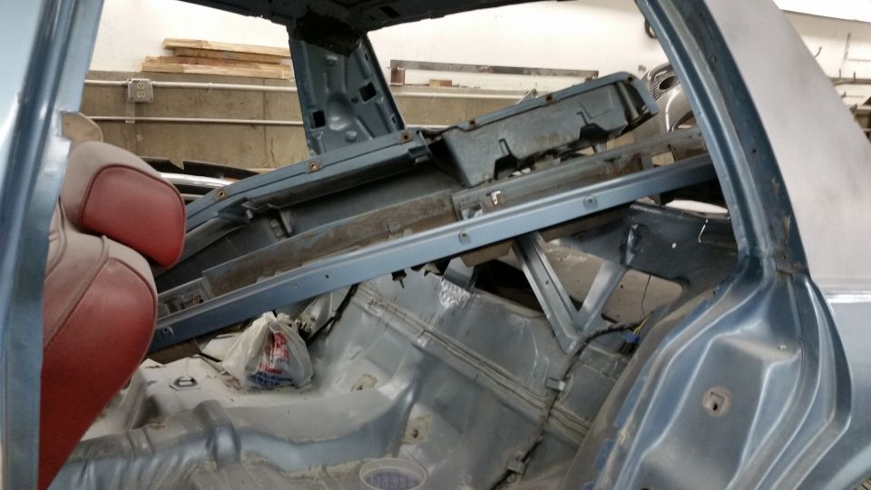 Stripped rear interior and package shelf area of a car shell