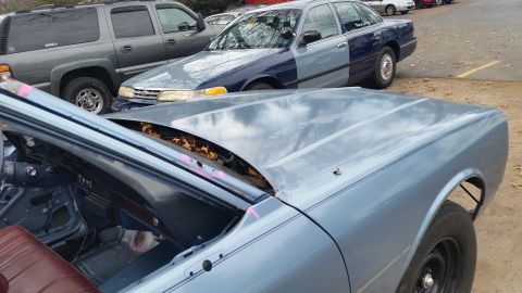 2001 Ford Crown Victoria - Photo of a project sedan open trunk lid, not a technical document.