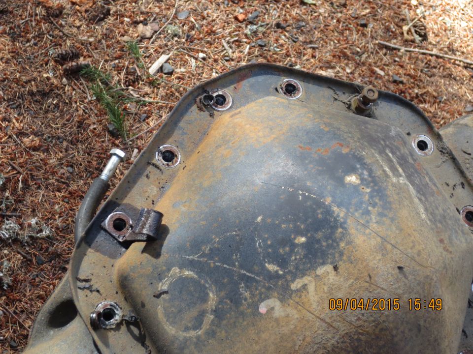 cover marked with 373. indicating it came with 3.73 gears. open diff.