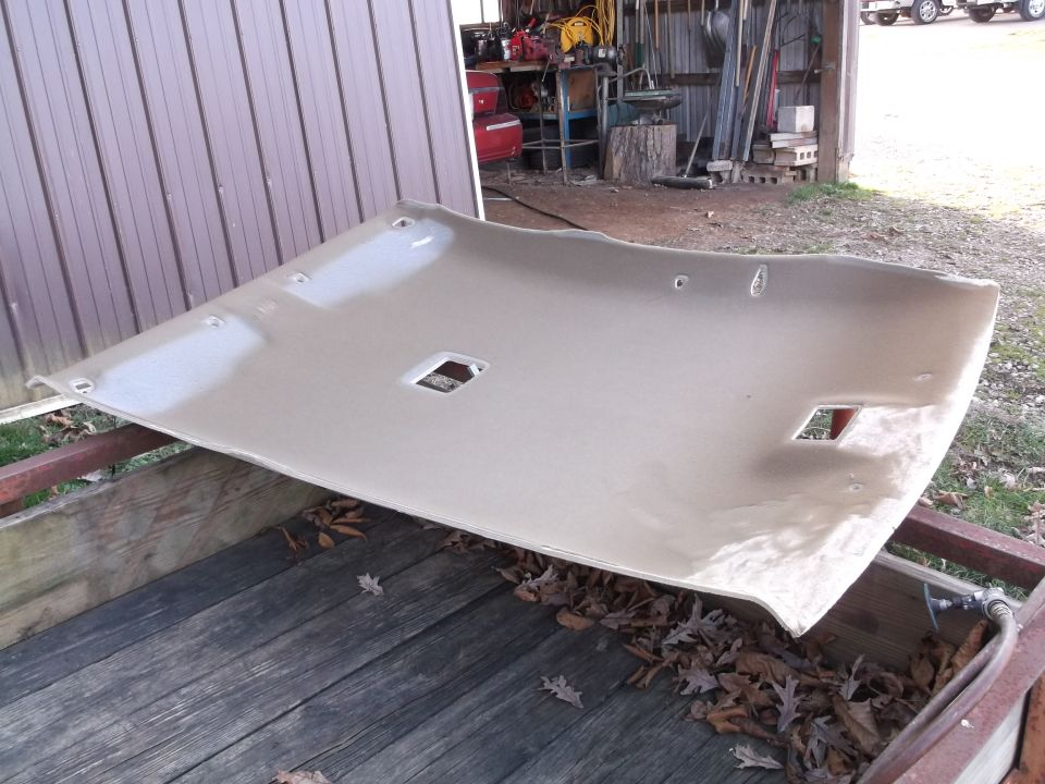 Beige car headliner on a trailer