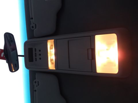 1999 Mercury Grand Marquis - Interior shot of a car's overhead console and illuminated lights.