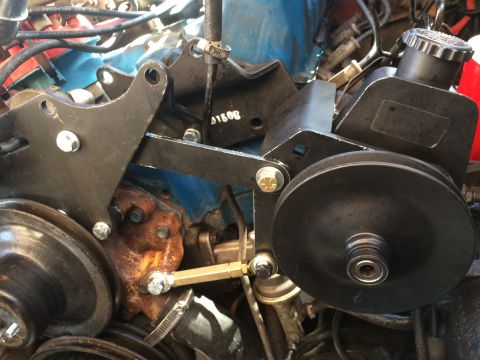 1979 Ford Bronco - Had to drill a hole in my ac compressor mounting place for the PS pump brace. It was supposed to go straight across and mount to the water…