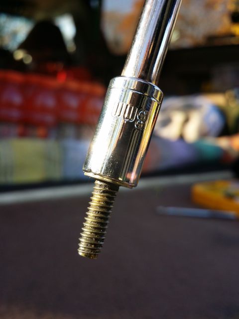 1988 Lincoln Mark VII - (Out of sequence) A small magnet holds the window motor bolt securely in the socket during replacement.