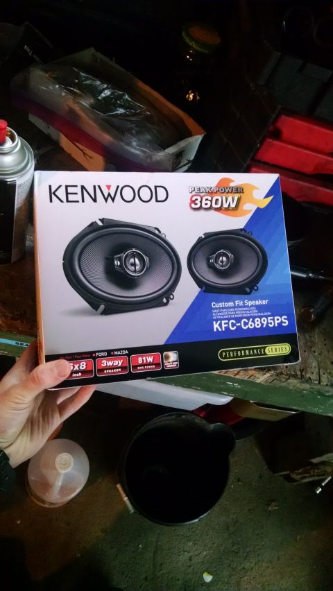 1994 Ford Bronco - A box of Kenwood KFC-C6895PS 6x8 inch, 3-way, 81W RMS power speakers is held by a hand. The box features images of the speakers and lists c…