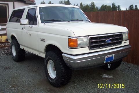 1990 Ford Bronco - This 1990 Ford Bronco is shown in a 3/4 front view, aftermarket wheels and tires.