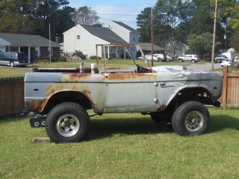 1972 Ford Bronco - This 1972 Ford Bronco is undergoing restoration and shows significant rust and missing components.