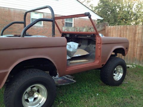 1972 Ford Bronco - This Ford Bronco is undergoing restoration, with its doors removed and primer applied.
