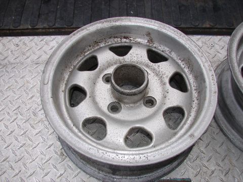 1973 Ford Ranchero - Close-up of a single aluminum wheel with visible wear and dirt.