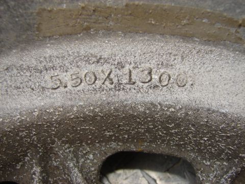 1973 Ford Ranchero - A close-up view of a wheel with "5.50X1300" stamped into its surface.