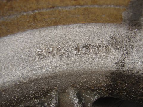 1973 Ford Ranchero - Close-up of a metal part showing the casting numbers SRC 1300.