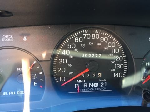 2001 Ford Crown Victoria - Dashboard gauges including speedometer, odometer, and fuel gauge are visible.