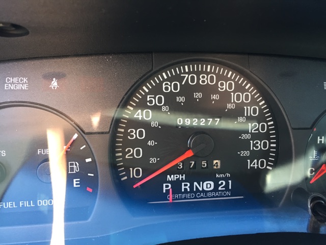 Car dashboard with speedometer, odometer showing 092277, and gear indicator