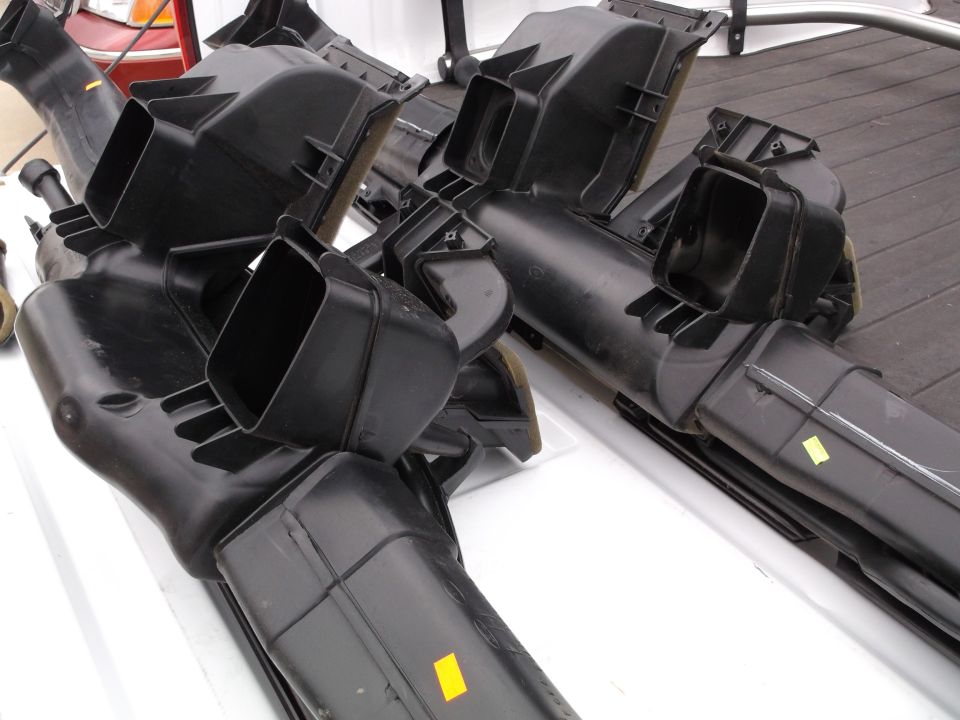 Black plastic HVAC ducting assemblies for a vehicle