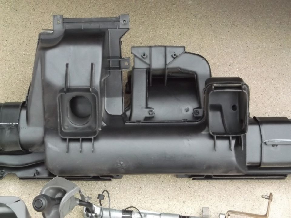 Black plastic air intake manifold assembly