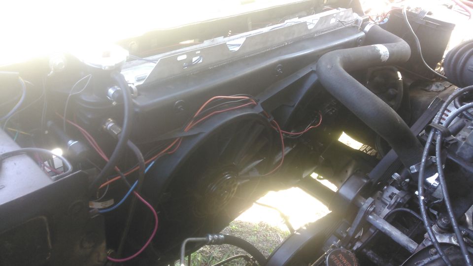after doing some trimming i got the fan installed and a relay kit wired up.