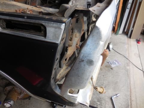 1979 Ford Bronco - The front fender and bumper assembly of a 1978 Ford Bronco are shown in a state of disassembly.
