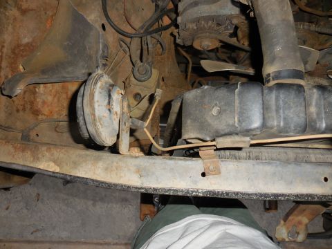 1979 Ford Bronco - This image shows a close-up view of various components within a vehicle's engine compartment.