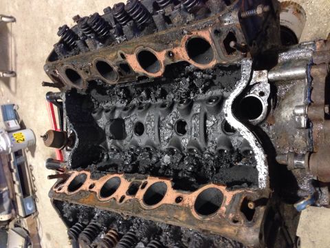 1979 Ford Bronco - Engine block with exhaust ports visible, likely from a V8 engine.