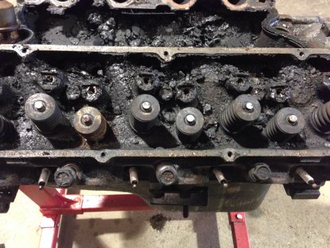 1979 Ford Bronco - This is a close-up view of an engine block, likely from a V8 engine, mounted on a stand for repair or display.
