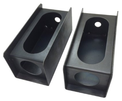 1987 Suzuki Samurai - Photograph of a pair of fabricated metal mounting brackets, not a technical document.
