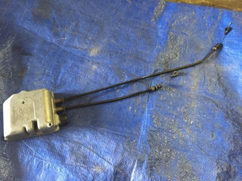2003 Lincoln Aviator - Ford door latch actuator with cables, likely for a vehicle door mechanism.