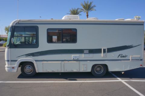 1995 Chevrolet P30 1 Ton - Step Van - This RV has 'Flair' badging on its side, indicating its model name.