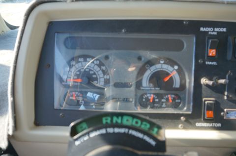 1995 Chevrolet P30 1 Ton - Step Van - The interior view of a vehicle's dashboard shows the speedometer, fuel gauge, and gear selector.