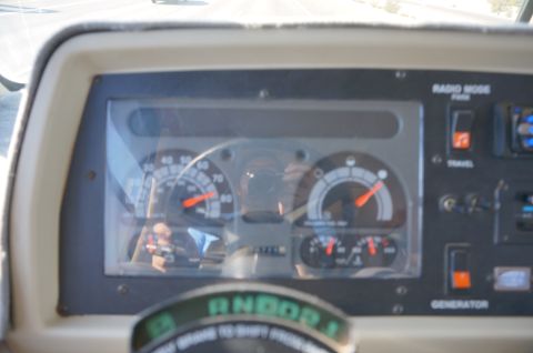 1995 Chevrolet P30 1 Ton - Step Van - Motorhome dashboard showing the instrument cluster with speedometer and gauges plus radio mode and generator switches.