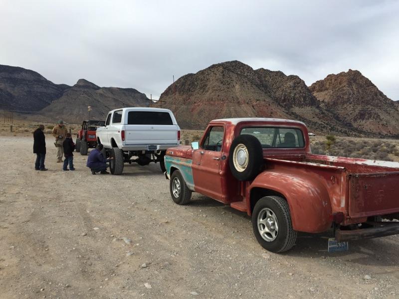 1979 Ford Bronco rear view, white, lifted on large tires