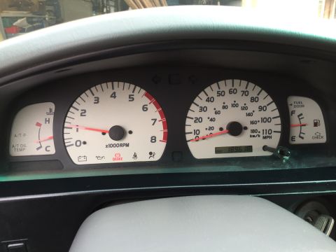 2001 Toyota Tacoma - The interior of a 2001 Toyota Tacoma shows its dashboard gauges, including the odometer reading 189,615 miles.