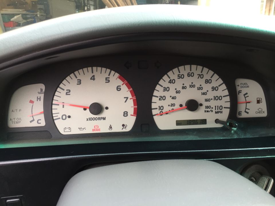 2001 Toyota Tacoma dashboard with tachometer, speedometer, fuel gauge, and odometer showing 189615 miles