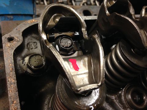 1979 Ford Bronco - This image shows internal engine components, specifically a rocker arm and valve spring, not the exterior of a vehicle.