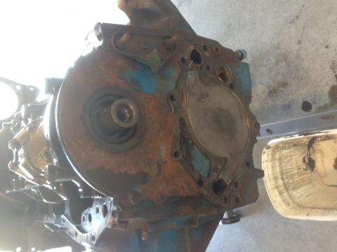 1979 Ford Bronco - This engine block appears to be in a state of disrepair, with significant rust and missing components.