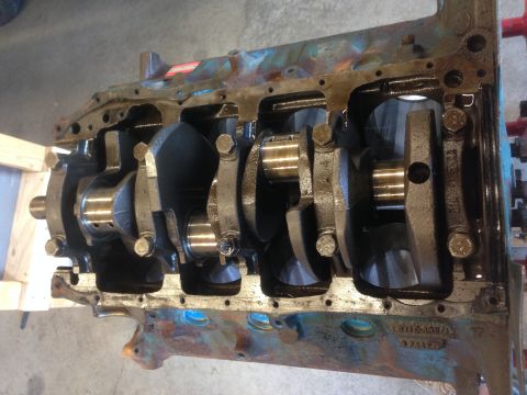 1979 Ford Bronco - Close-up view of an engine block's internal components, including the crankshaft and connecting rods.