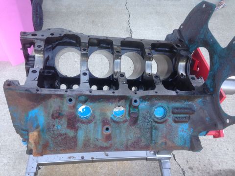 1979 Ford Bronco - This engine block shows significant rust and wear, indicating it is a part, not a complete vehicle.