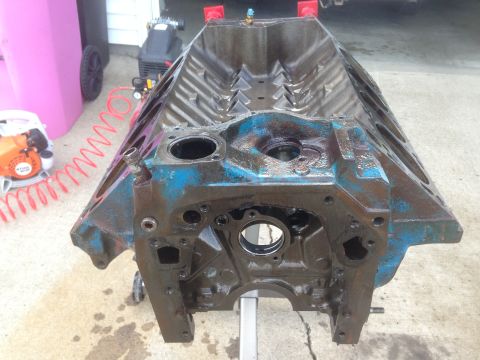 1979 Ford Bronco - Engine block on a stand, showing signs of wear and a blue paint finish.