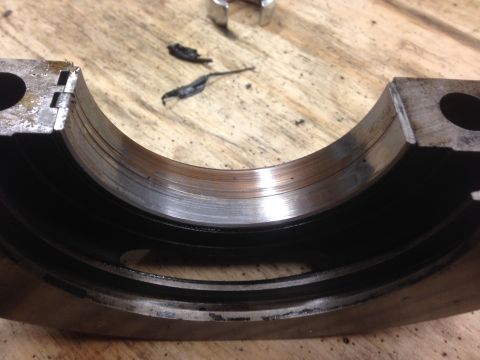 1979 Ford Bronco - This engine bearing shows significant wear and contamination, indicating a need for replacement.